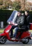 Amsterdam 8 maart 2016
Martijn Krabbe met zijn vriendin Noi Pakon op zijn vespa scooter.