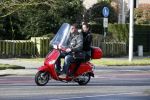 Amsterdam 8 maart 2016
Martijn Krabbe met zijn vriendin Noi Pakon op zijn vespa scooter.