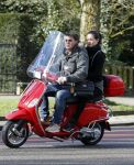 Amsterdam 8 maart 2016
Martijn Krabbe met zijn vriendin Noi Pakon op zijn vespa scooter.