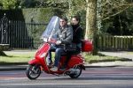 Amsterdam 8 maart 2016
Martijn Krabbe met zijn vriendin Noi Pakon op zijn vespa scooter.