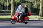 Amsterdam 8 maart 2016
Martijn Krabbe met zijn vriendin Noi Pakon op zijn vespa scooter.