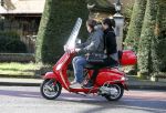 Amsterdam 8 maart 2016
Martijn Krabbe met zijn vriendin Noi Pakon op zijn vespa scooter.