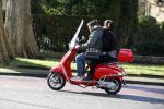 Amsterdam 8 maart 2016
Martijn Krabbe met zijn vriendin Noi Pakon op zijn vespa scooter.