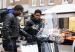 Amnsterdam 13 februari 2016 
Roue Verveer bij zijn zoon achter op de vespa scooter