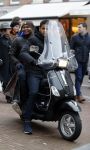 Amnsterdam 13 februari 2016 
Roue Verveer bij zijn zoon achter op de vespa scooter