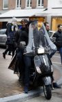 Amnsterdam 13 februari 2016 
Roue Verveer bij zijn zoon achter op de vespa scooter