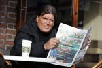 Amsterdam 3 februari 2017 
Frank masmeijer leest krant op terras bij starbucks