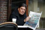 Amsterdam 3 februari 2017 
Frank masmeijer leest krant op terras bij starbucks