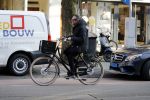Amsterdam 21 februari 2018
Henny Vrienten met zijn zoon op de fiets
