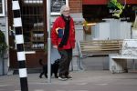 Amsterdam 23 februari 2018 
John v d Rest wandelend met zijn hond