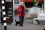 Amsterdam 23 februari 2018 
John v d Rest wandelend met zijn hond