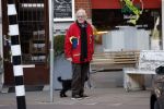 Amsterdam 23 februari 2018 
John v d Rest wandelend met zijn hond