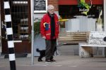 Amsterdam 23 februari 2018 
John v d Rest wandelend met zijn hond