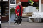 Amsterdam 23 februari 2018 
John v d Rest wandelend met zijn hond
