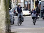Amsterdam 5 maart 2018 
Patrick Stoof met zijn dochter op de fiets in Amsterdam