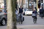 Amsterdam 5 maart 2018 
Patrick Stoof met zijn dochter op de fiets in Amsterdam