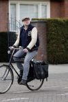 Amsterdam 5 maart 2018 
Patrick Stoof met zijn dochter op de fiets in Amsterdam