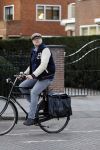 Amsterdam 5 maart 2018 
Patrick Stoof met zijn dochter op de fiets in Amsterdam