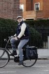 Amsterdam 5 maart 2018 
Patrick Stoof met zijn dochter op de fiets in Amsterdam