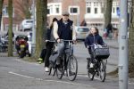 Amsterdam 5 maart 2018 
Patrick Stoof met zijn dochter op de fiets in Amsterdam