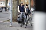 Amsterdam 5 maart 2018 
Patrick Stoof met zijn dochter op de fiets in Amsterdam