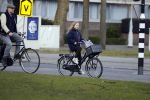 Amsterdam 5 maart 2018 
Patrick Stoof met zijn dochter op de fiets in Amsterdam