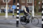 Amsterdam 5 maart 2018 
Patrick Stoof met zijn dochter op de fiets in Amsterdam