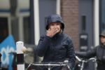 Amsterdam 2 maart 2020
Tjitske Reidinga met zoon in de regen op de fiets.