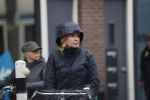 Amsterdam 2 maart 2020
Tjitske Reidinga met zoon in de regen op de fiets.