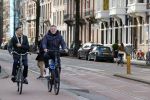 Amsterdam 20 februari 2021
Erwin Olaf met partner  op de fiets in Amsterdam zuid.