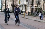 Amsterdam 20 februari 2021
Erwin Olaf met partner  op de fiets in Amsterdam zuid.