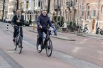 Amsterdam 20 februari 2021
Erwin Olaf met partner  op de fiets in Amsterdam zuid.