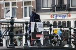 Amsterdam 16 februari 2021
Gerard Spong in zijn Rolls Royce en wandelend op straat met mondkapje.