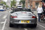 Amsterdam 8 mei 2006
Dean Gorre met porsche cabrio op pc hooftstraat