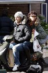 Amsterdam 25 maart 2006
Winston Gerschtanowitz met Renate Verbaanop vespa scooter.
Renate steekt tong uit
