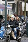 Amsterdam 25 maart 2006
Winston Gerschtanowitz met Renate Verbaanop vespa scooter.
Renate met petje