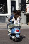 Amstedam 25 april 2007
Patrick Kluivert met fuck the paparazzi t shirt en zijn zwangere vriendin Rossana Lima op vespa scooter door amsterdam.