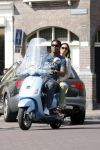 Amstedam 25 april 2007
Patrick Kluivert met fuck the paparazzi t shirt en zijn zwangere vriendin Rossana Lima op vespa scooter door amsterdam.
