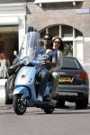 Amstedam 25 april 2007
Patrick Kluivert met fuck the paparazzi t shirt en zijn zwangere vriendin Rossana Lima op vespa scooter door amsterdam.