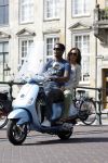 Amstedam 25 april 2007
Patrick Kluivert met fuck the paparazzi t shirt en zijn zwangere vriendin Rossana Lima op vespa scooter door amsterdam 2007.