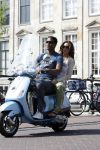 Amstedam 25 april 2007
Patrick Kluivert met fuck the paparazzi t shirt en zijn zwangere vriendin Rossana Lima op vespa scooter door amsterdam.