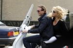 Amsterdam 25 april 2010
Patricia Paay staat doodsangsten uit bij Nicky v Dam achter op zijn vespa scooter.
Peter Smulders bv