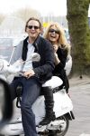 Amsterdam 25 april 2010
Patricia Paay staat doodsangsten uit bij Nicky v Dam achter op zijn vespa scooter.
Peter Smulders bv