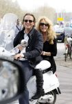 Amsterdam 25 april 2010
Patricia Paay staat doodsangsten uit bij Nicky v Dam achter op zijn vespa scooter.
Peter Smulders bv