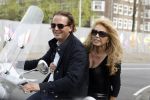 Amsterdam 25 april 2010
Patricia Paay staat doodsangsten uit bij Nicky v Dam achter op zijn vespa scooter.
Peter Smulders bv