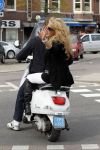 Amsterdam 25 april 2010
Patricia Paay staat doodsangsten uit bij Nicky v Dam achter op zijn vespa scooter.
Peter Smulders bv