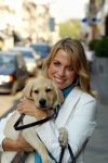 Amsterdam 17 september 2003

vivian reys met moeder en  hondje (golden retriever)

Peter Smulders bv