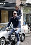 Amsterdam 27 april 2013
Bart v Trojen met zoon op fiets.
Peter Smulders bv