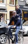 Amsterdam 27 april 2013
Bart v Trojen met zoon op fiets.
Peter Smulders bv