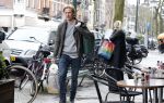 Amsterdam 19 april 2013
Ajax speler Christian Poulsen met zijn vrouw op de cornelis schuytstraat.
Peter Smulders bv